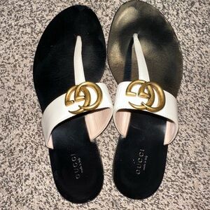 Gucci Women's Black and White Sandals with Gold Logo